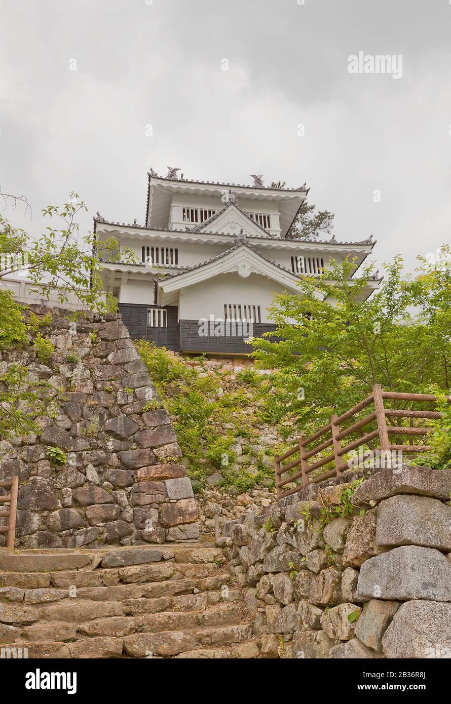 Main Keep (donjon) of Yoshida Castle, Japan. Castle was founded in 1505 by Makino Kohaku, destroyed in a fire in 1873 and reconstructed in 1954 Stock Photo
