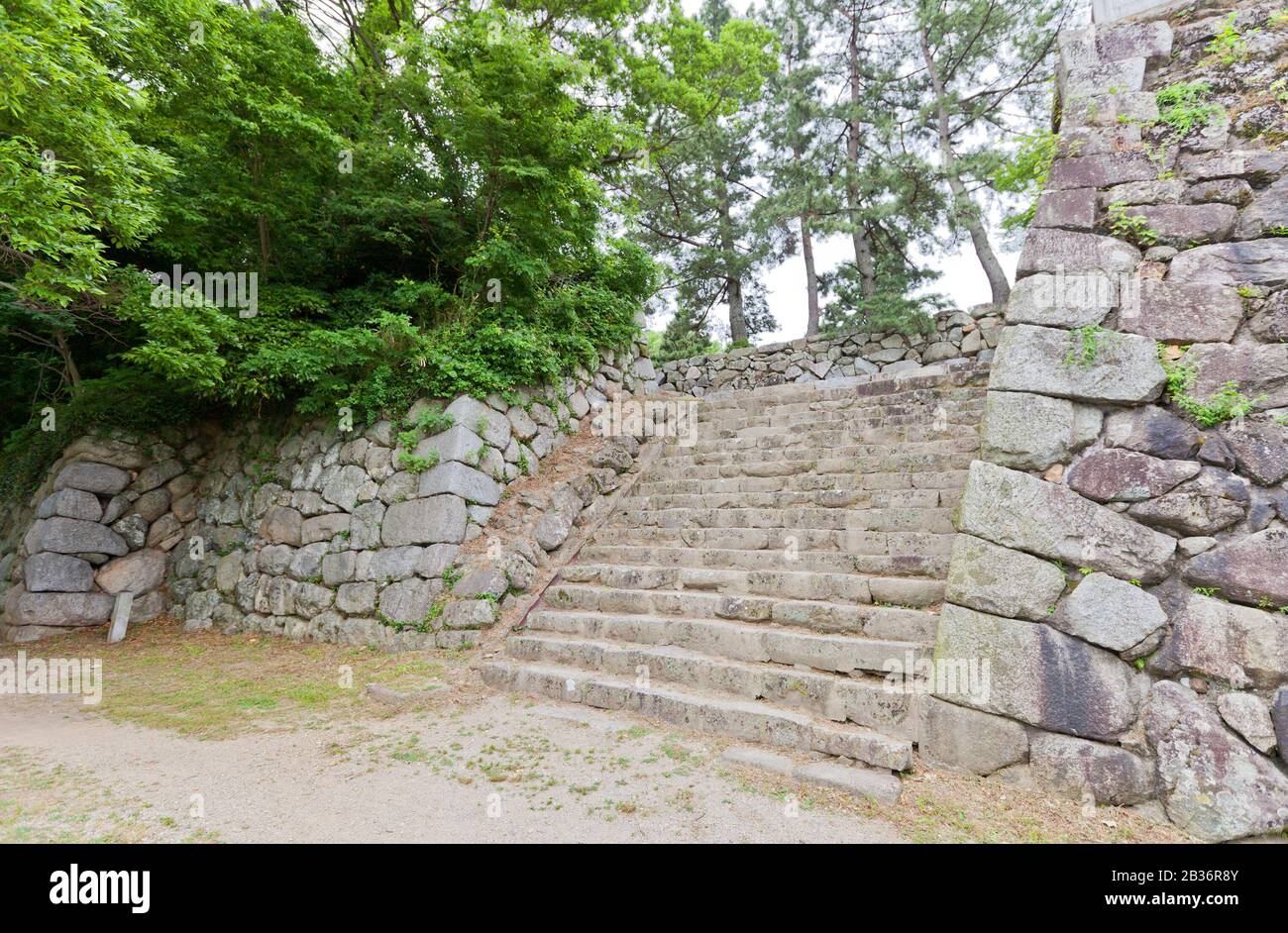 Stone walls of Yoshida Castle, Japan. Castle was founded in 1505 by Makino Kohaku, destroyed in a fire in 1873 and reconstructed in 1954 Stock Photo