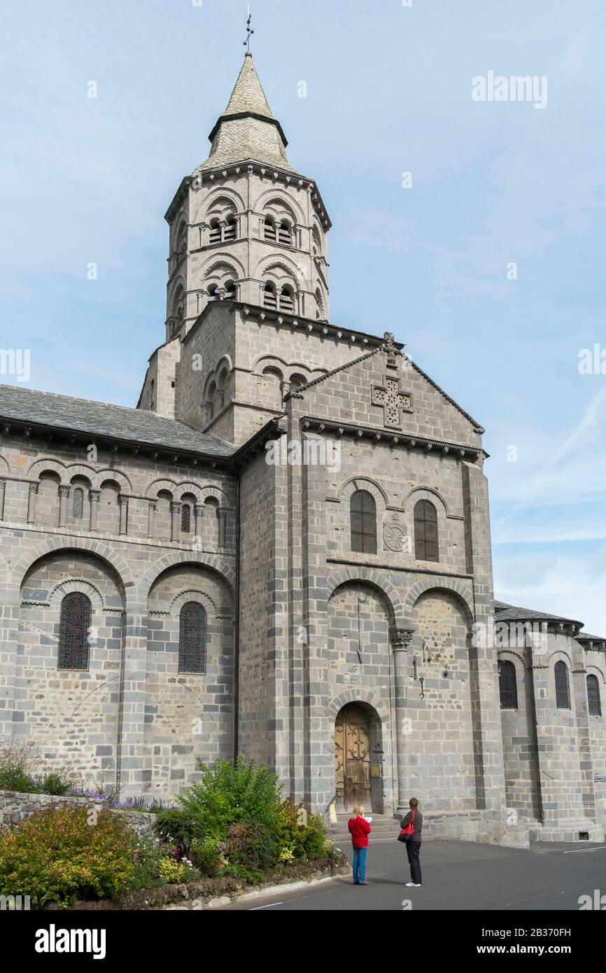 France, Puy de Dome, Parc Naturel Regional des Volcans d'Auvergne (Regional Nature Park of the Volcanoes of Auvergne), Orcival, Notre Dame Basilica built between 1146 and 1178, typical Romanesque church of Auvergne region Stock Photo