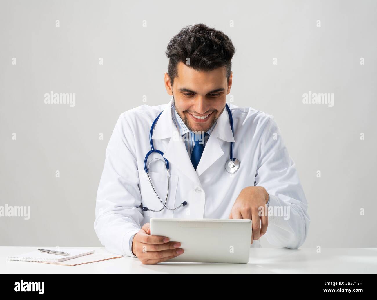 Internist Young smiling internist using hi-res stock photography and images - Alamy