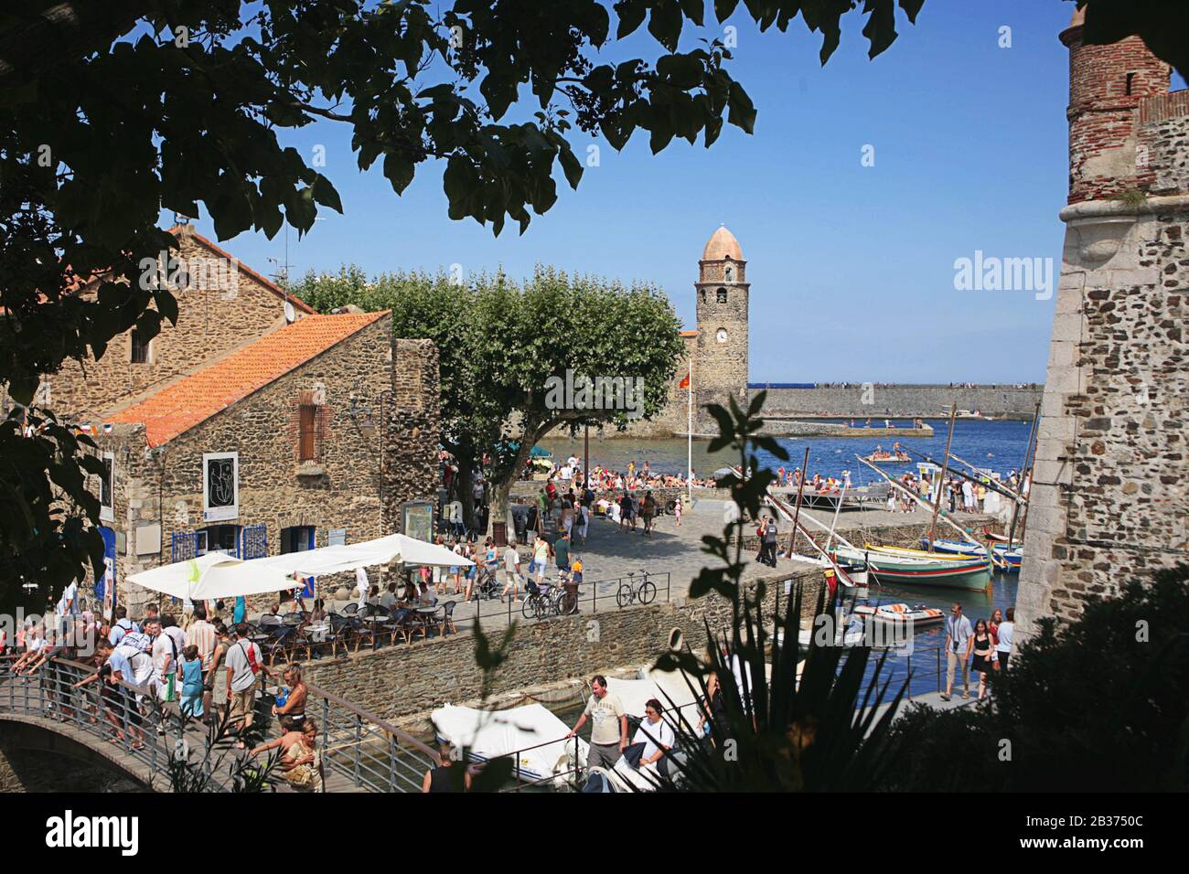 The belltower of the church of Notre-Dame-des-Anges, Boulevard du Boramar and the inner harbour, Collioure, Pyrénées-Orientales, Occitanie, France Stock Photo
