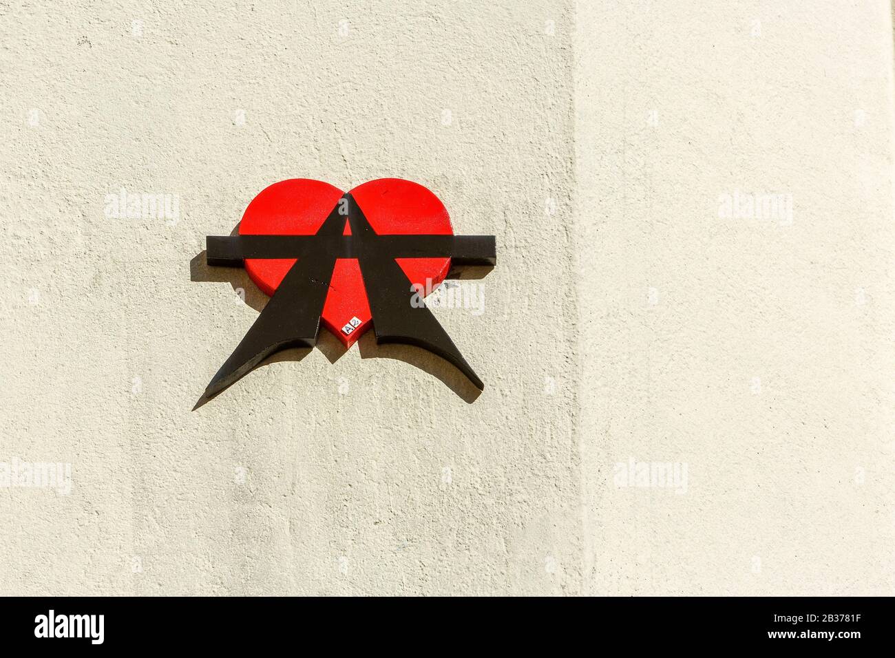 France, Paris, street art, symbol by the group named A2 Louise Michel (Anarchie et Amour Anarchy and Love) on a facade of the rue des Cinq Diamants in the Butte aux Cailles district Stock Photo