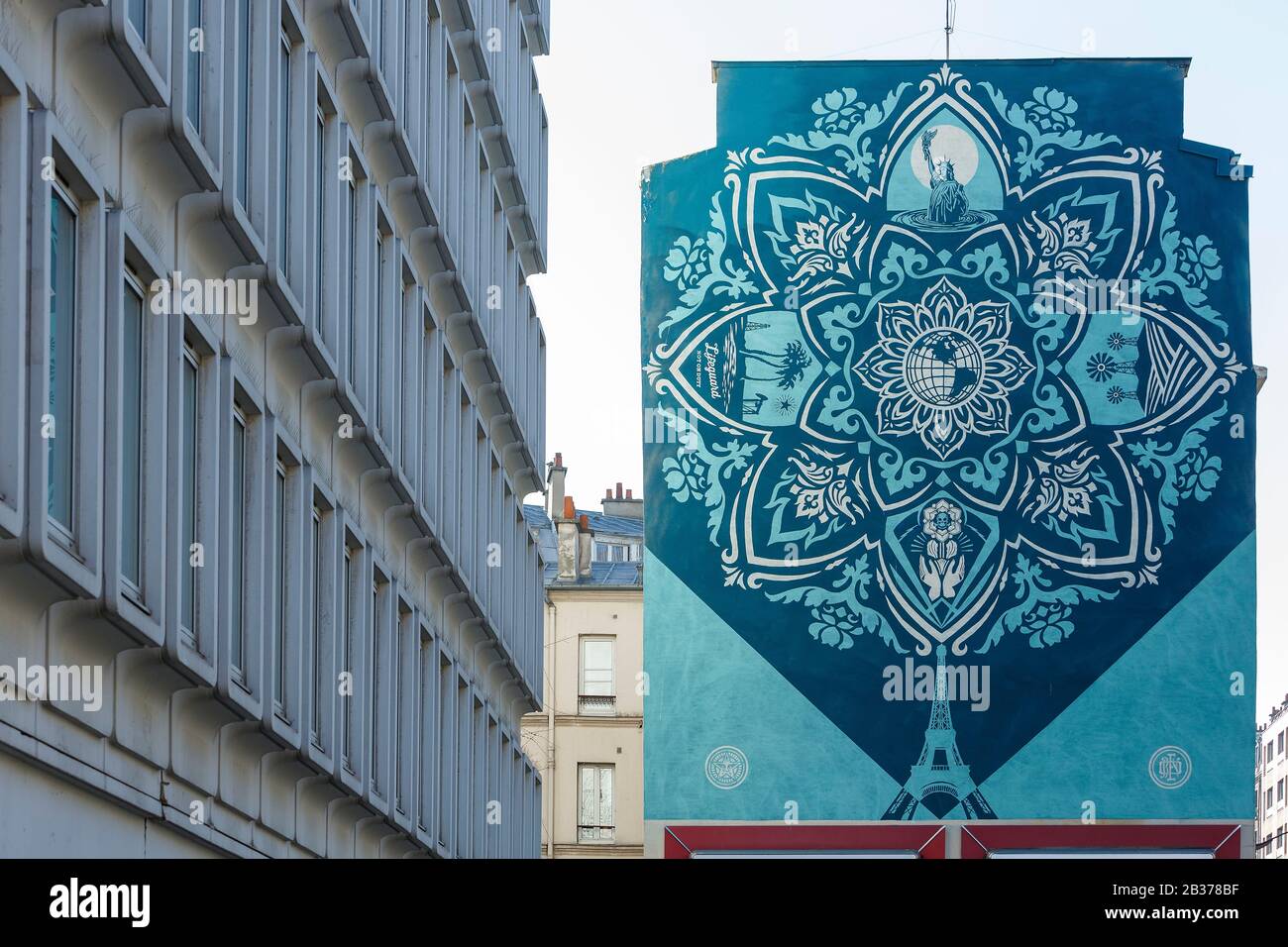 France, Paris, street art, mural called Delicate Balance by Shepard Fairey in rue Jeanne d'Arc Stock Photo