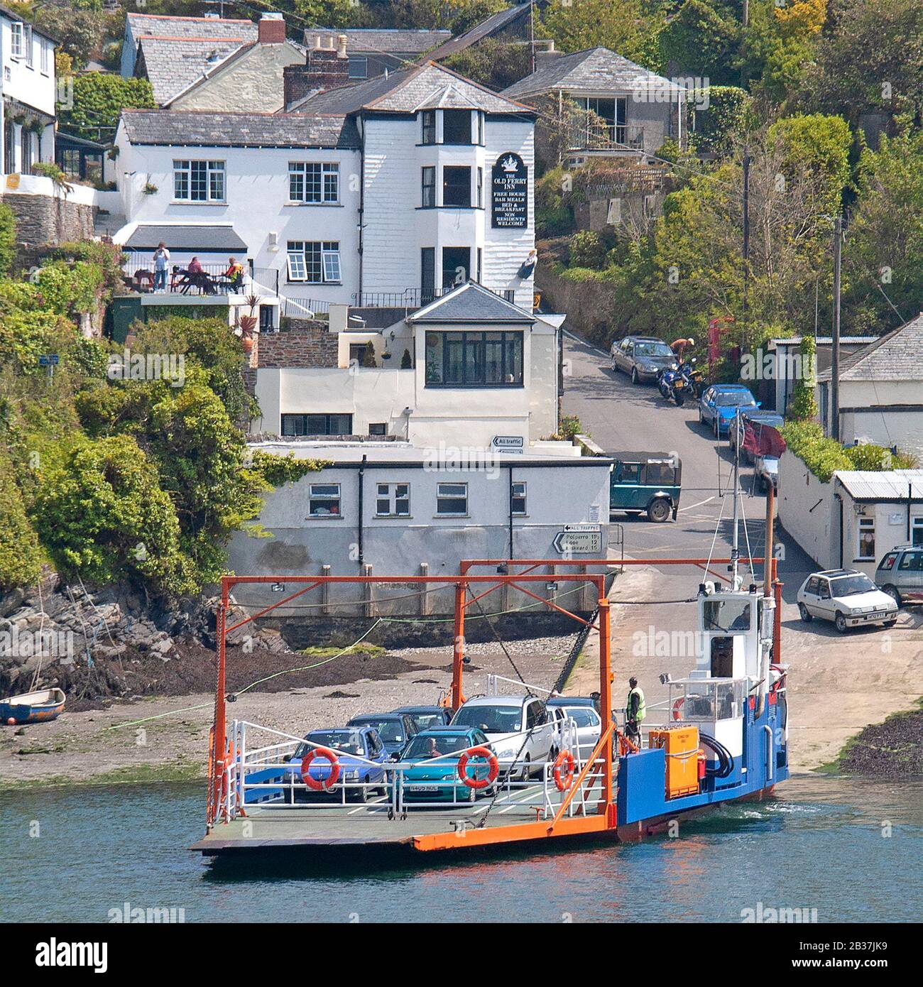Loaded car ferry departing Bodinnick village ferry terminal beside Old