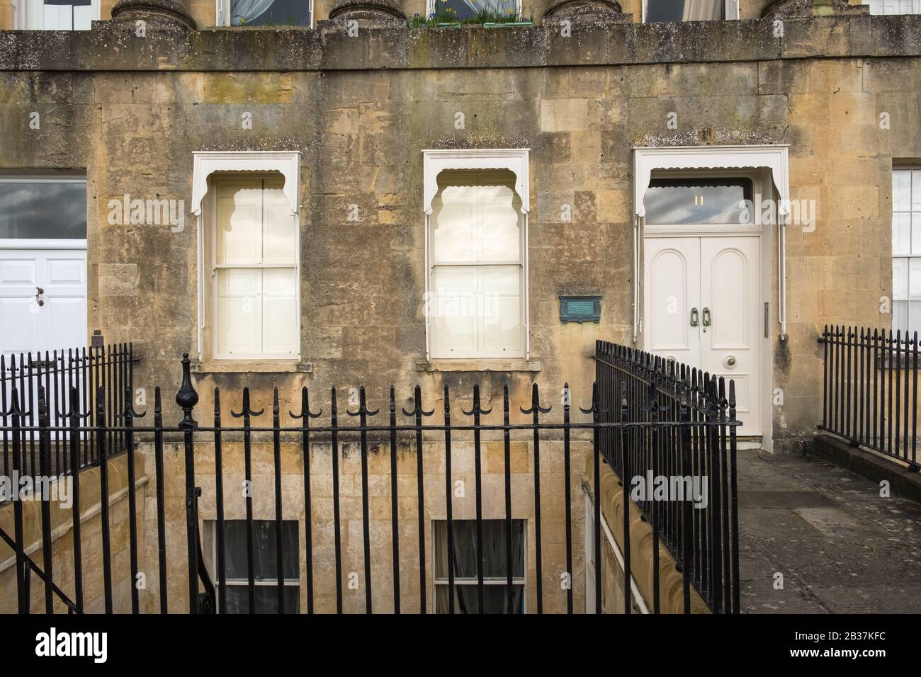 Royal Crescent in Bath, Somerset is famous for its curved row of Regency style homes overlooking the green Stock Photo