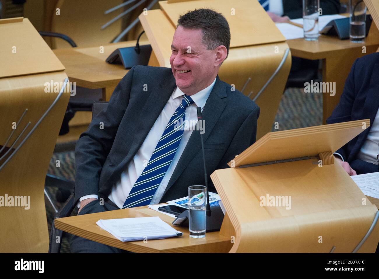 Edinburgh, UK. 4th Mar, 2020. Pictured: Murdo Fraser MSP - Shadow Cabinet Secretary for the Constitution and External Affairs for the Scottish Conservative and Unionist Party. Scottish Government Debate: Scottish Rate Resolution Scenes inside the debating chamber of the Scottish Parliament. Credit: Colin Fisher/Alamy Live News Credit: Colin Fisher/Alamy Live News Stock Photo