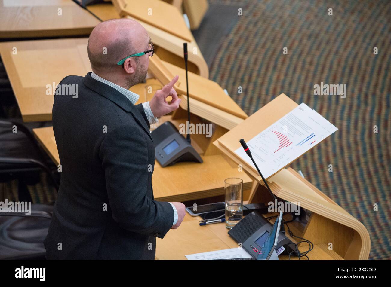 Edinburgh, UK. 4th Mar, 2020. Pictured: Patrick Harvie MSP - Co Leader or the Scottish Green Party. Scottish Government Debate: Scottish Rate Resolution Scenes inside the debating chamber of the Scottish Parliament. Credit: Colin Fisher/Alamy Live News Credit: Colin Fisher/Alamy Live News Stock Photo