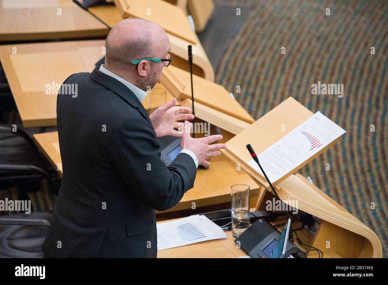 Edinburgh, UK. 4th Mar, 2020. Pictured: Patrick Harvie MSP - Co Leader or the Scottish Green Party. Scottish Government Debate: Scottish Rate Resolution Scenes inside the debating chamber of the Scottish Parliament. Credit: Colin Fisher/Alamy Live News Credit: Colin Fisher/Alamy Live News Stock Photo