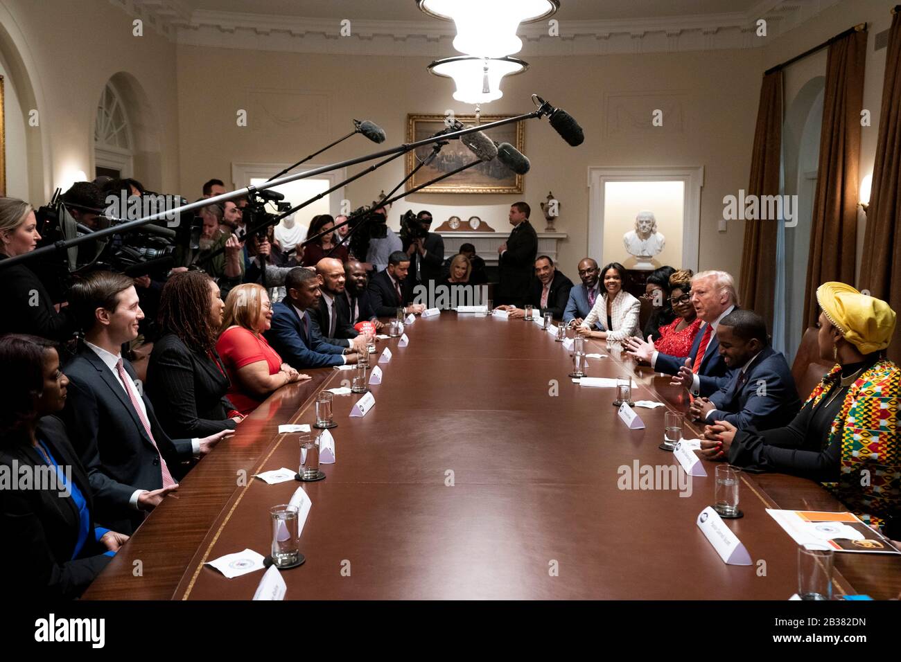 U.S President Donald Trump hosts a Black History Month event with African American Leaders and Pastor Paula White in the Cabinet Room of the White House February 27, 2020 in Washington, DC. Stock Photo