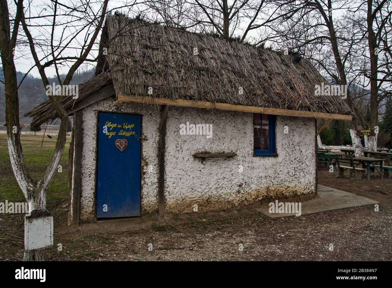 Koviljaca Spa, Sunny River, January 26, 2019. An old building with a toilet where it says, 'The king is walking here too'. Stock Photo