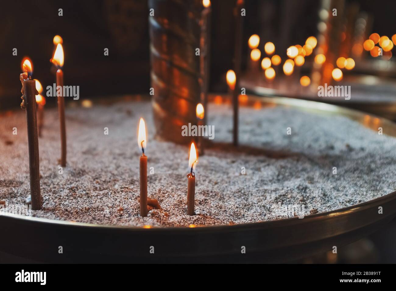 Church candles in red yellow hi-res stock photography and images - Alamy