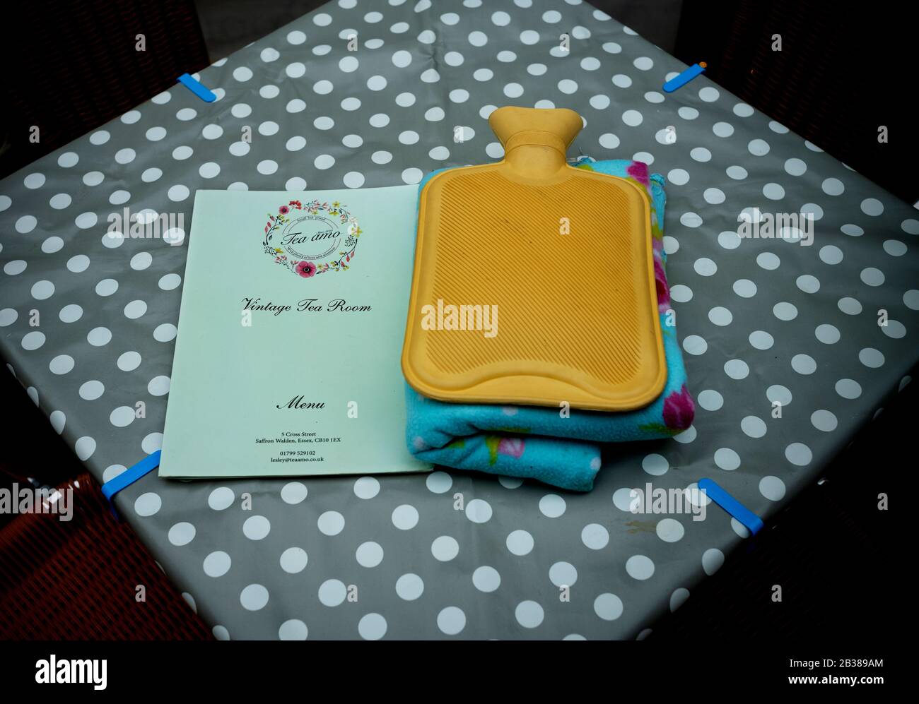 Saffron Walden, UK. 04th Mar, 2020. Saffron Walden Essex UK. Hot water bottle and blanket waiting for outdoor customers on a cold spring day at local Vintage Tea Rooms. 4 March 2020 Credit: BRIAN HARRIS/Alamy Live News Stock Photo