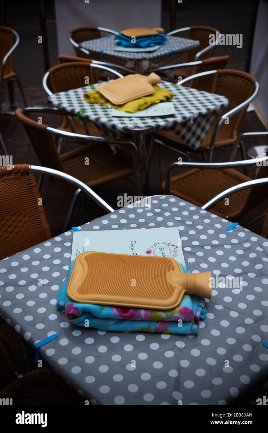 Saffron Walden, UK. 04th Mar, 2020. Saffron Walden Essex UK. Hot water bottle and blanket waiting for outdoor customers on a cold spring day at local Vintage Tea Rooms. 4 March 2020 Credit: BRIAN HARRIS/Alamy Live News Stock Photo