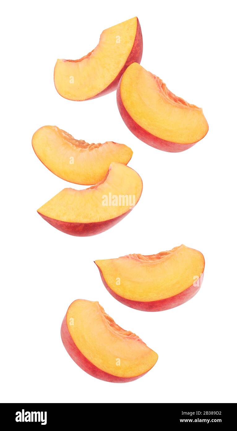Isolated cut peaches. Six pieces of fresh peach fruits in the air
