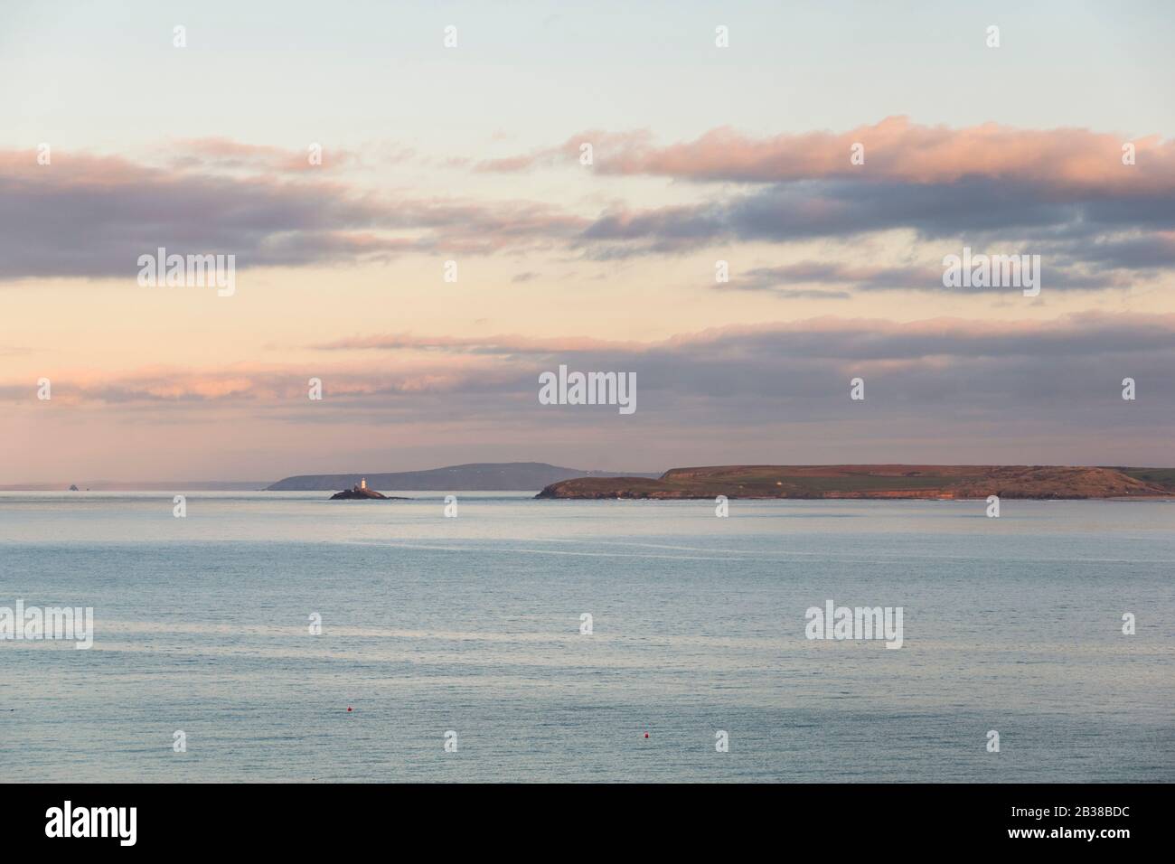 Sunset from St Ives looking towards Godrevy Lighthouse Stock Photo