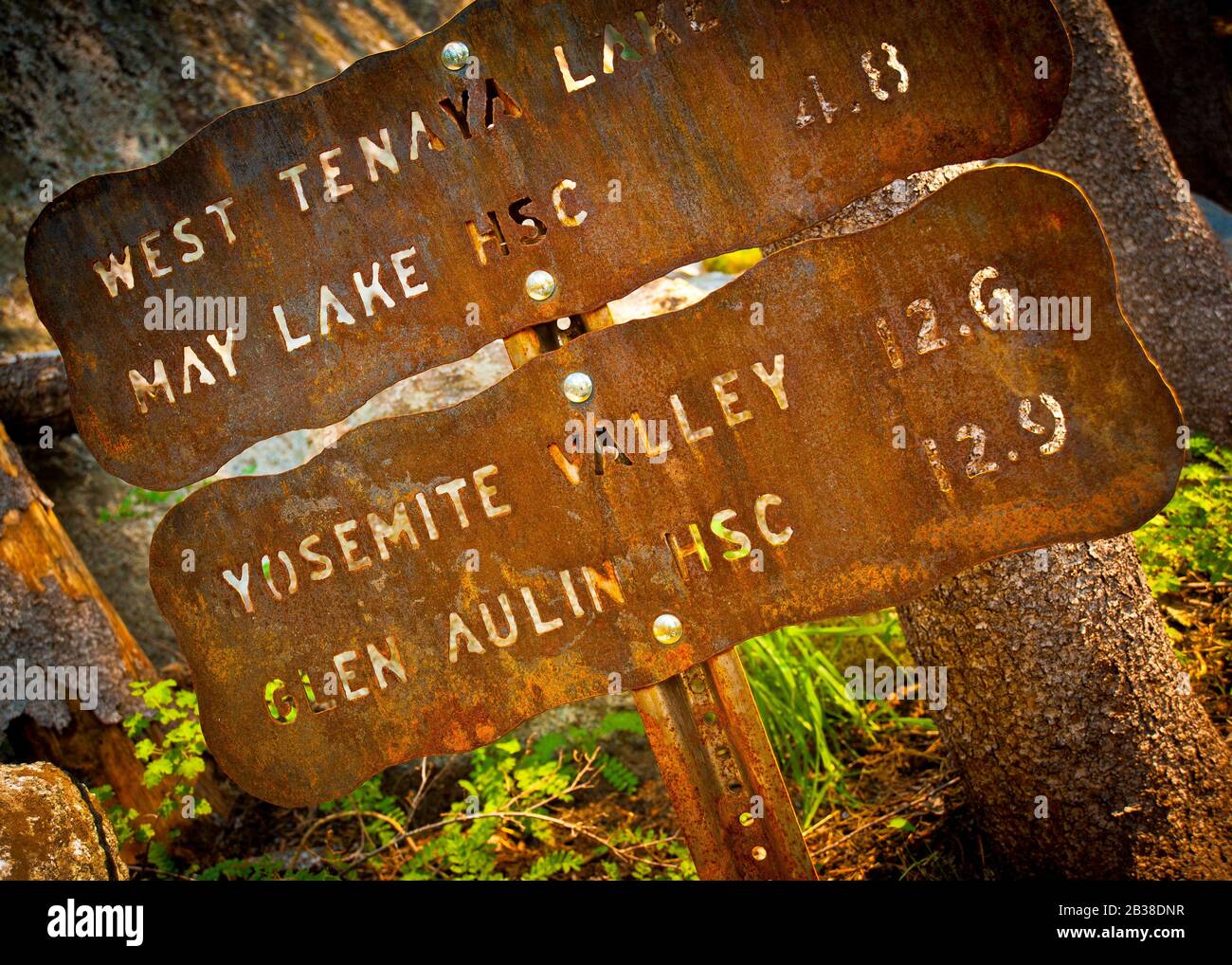 old rusty directional sign post with distances to destinations,Yosimite national park, Stock Photo