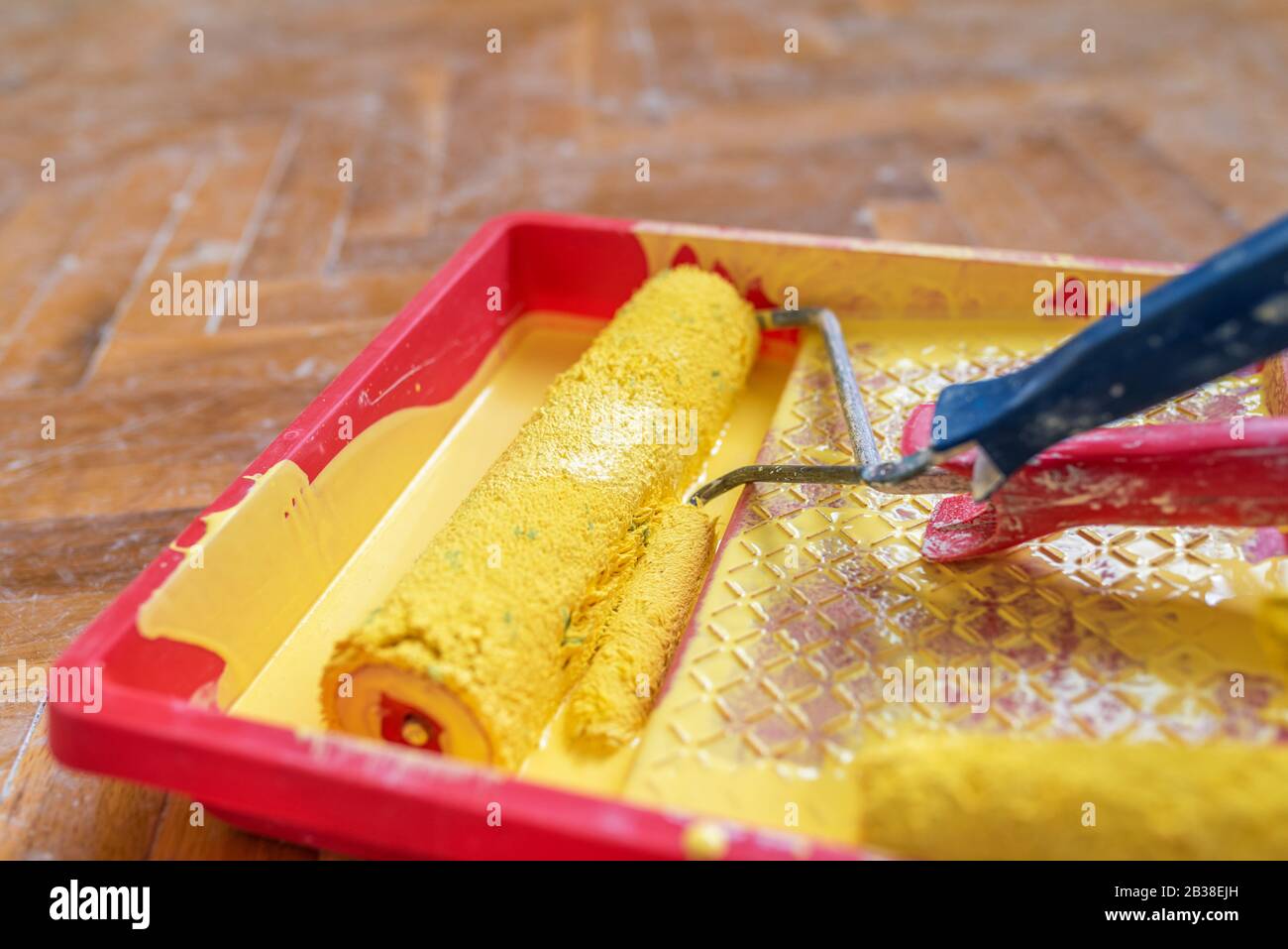 Painted wall and painting supplies ,roller, brush, tray liner and paint