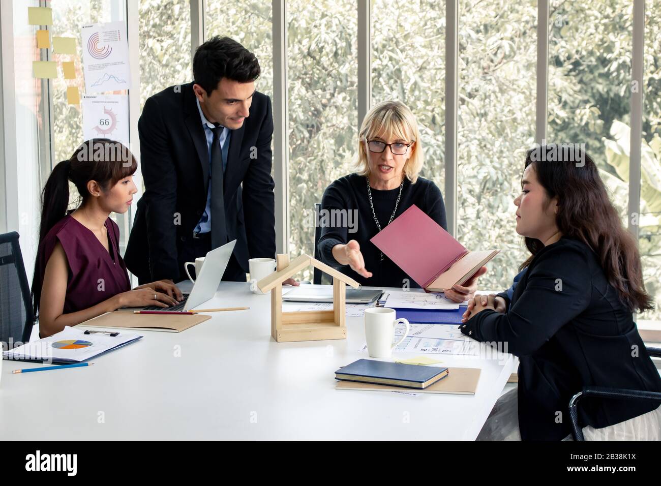 Broker and the customer, negotiation of purchase sale house. Team that