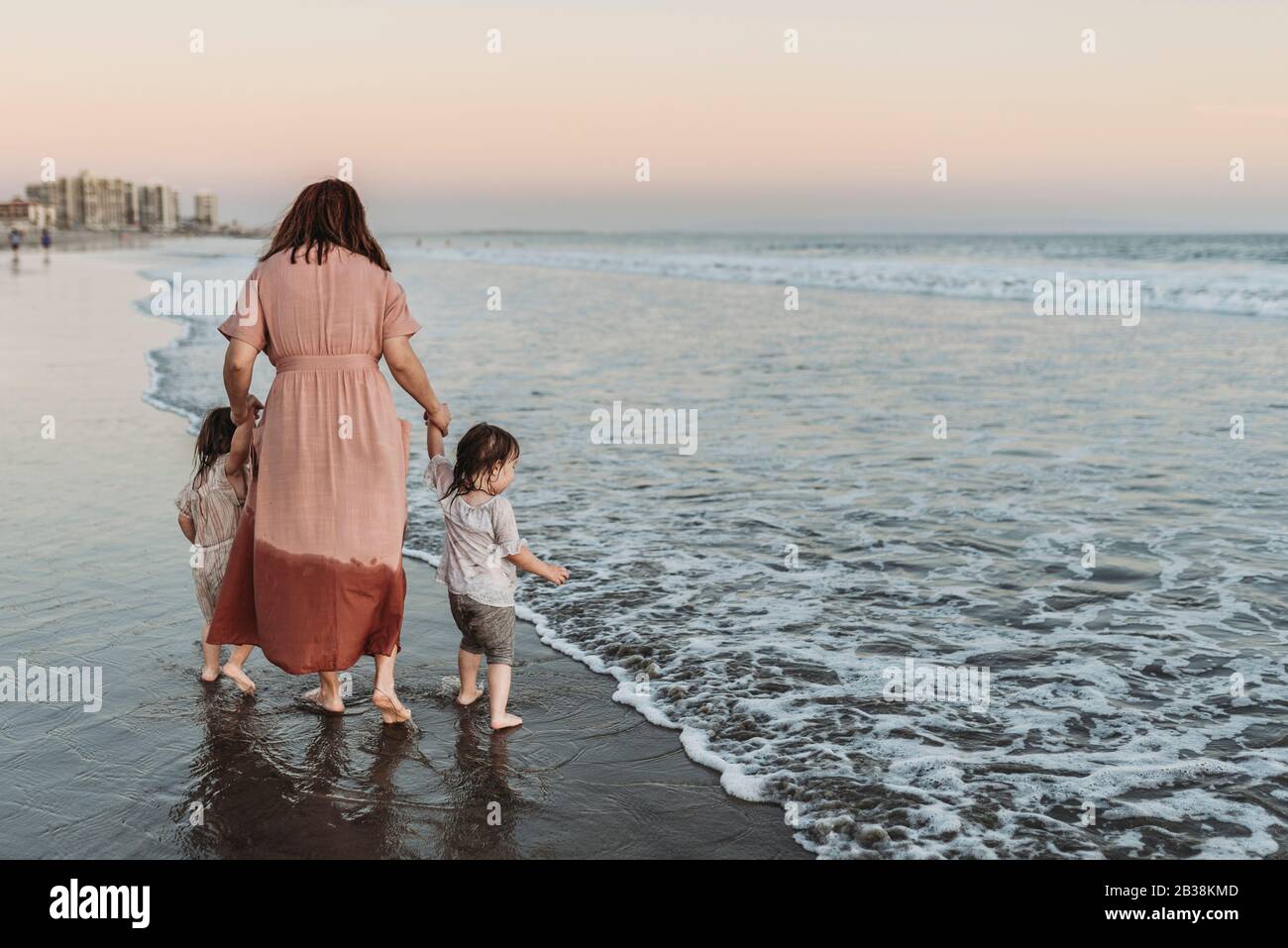 Mother 2 daughters behind hi-res stock photography and images - Alamy