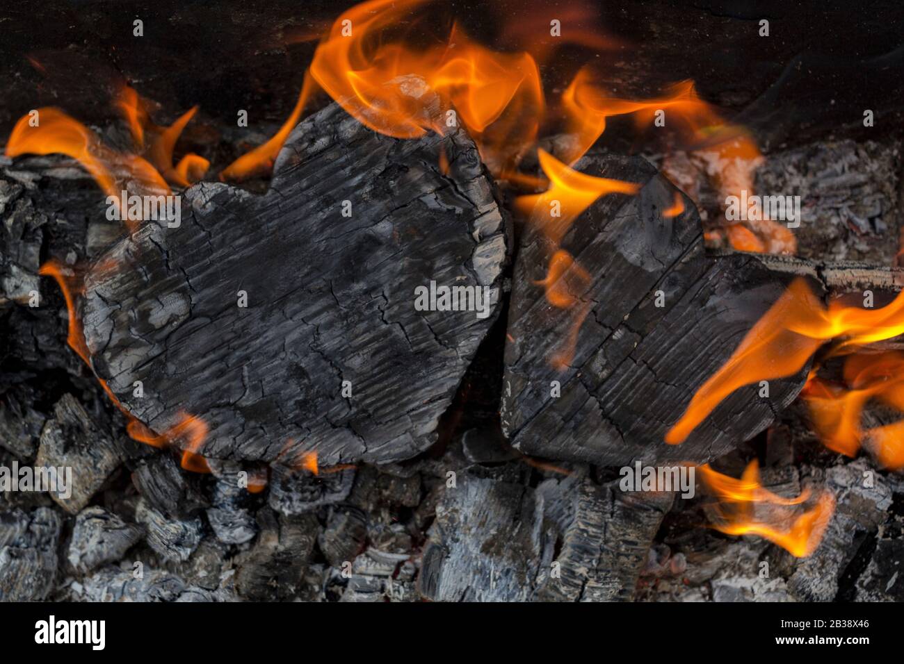 Hot Coals And Burning Woods In The Form Of Human Heart Glowing And Flaming Charcoal Bright Red Fire And Ash Close Up Top View Stock Photo Alamy