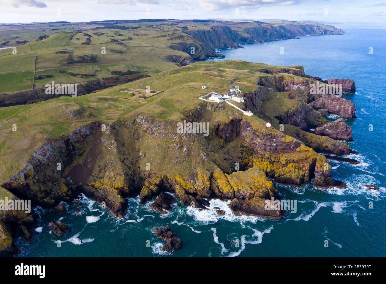 Aerial view of St Abbs Head with lighthouse in Scottish Borders, Scotland, UK Stock Photo