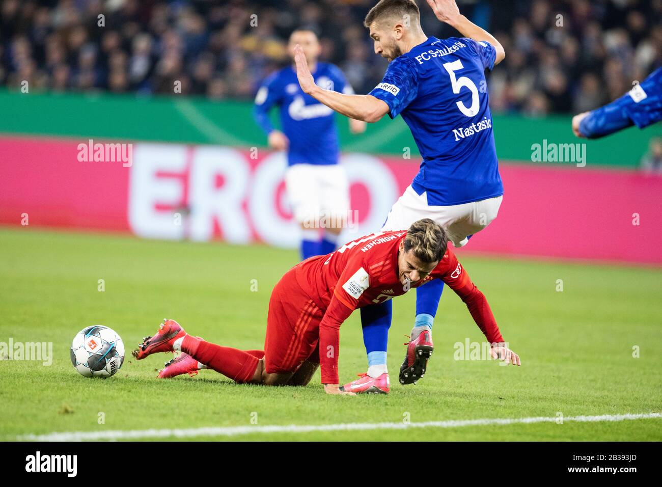 Gelsenkirchen, Germany, Veltins-Arena, 3.03.2020: Philippe Coutinho of Muenchen (L) challenges Matija Nastasic of Schalke 04 during the cup match DFB Stock Photo