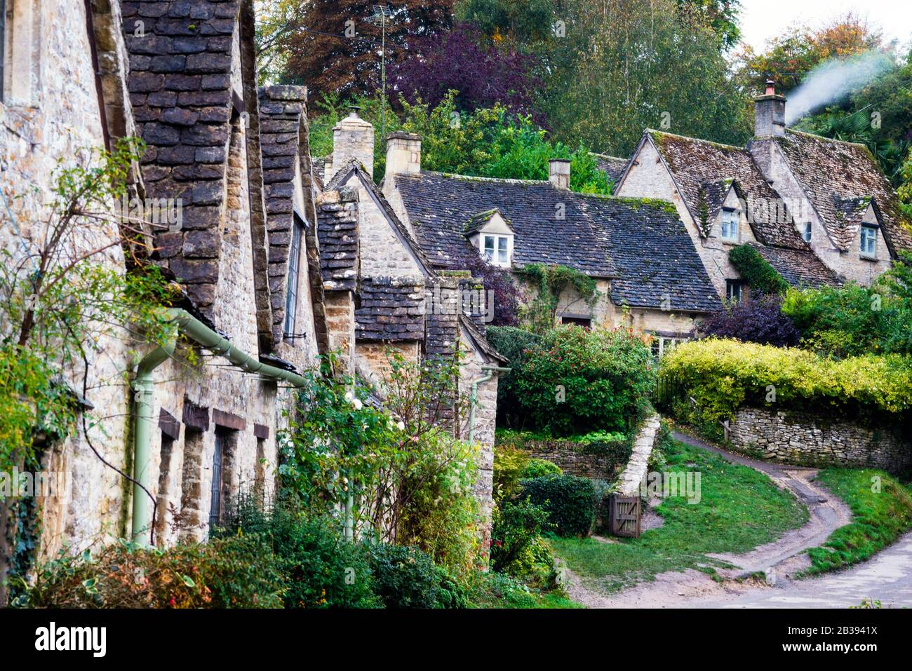 Arlington Row in Bibury is depicted on the inside cover of all British passports, the Cotswolds, England. Stock Photo