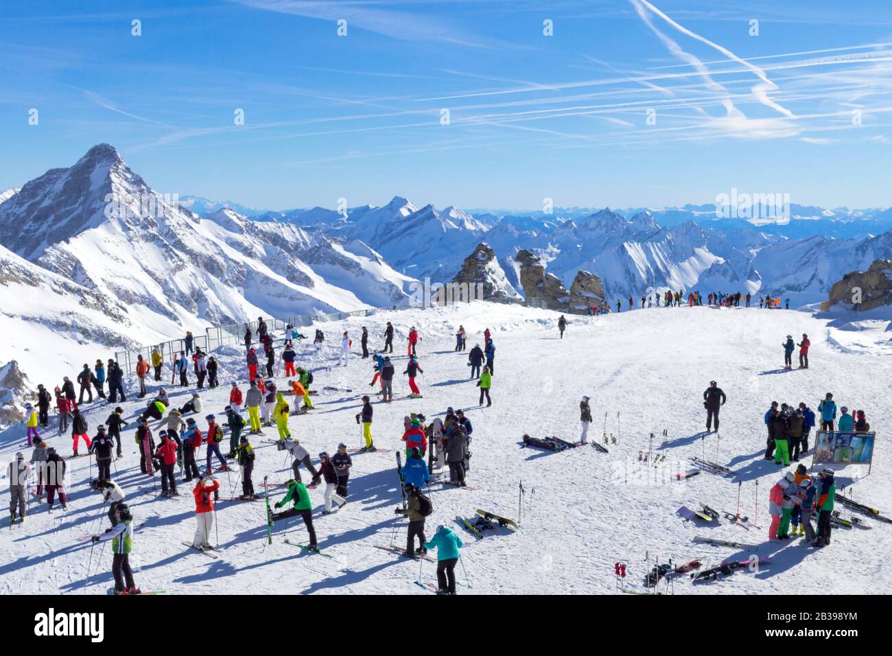 Austria Hintertux - 04 February 2019 : Many skiers and snowboarders stand on the slope before going down in the Austrian curort in Alps.Tirol. Stock Photo