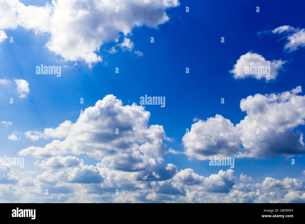 Blue summer sunny sky with white clouds.Background Stock Photo - Alamy