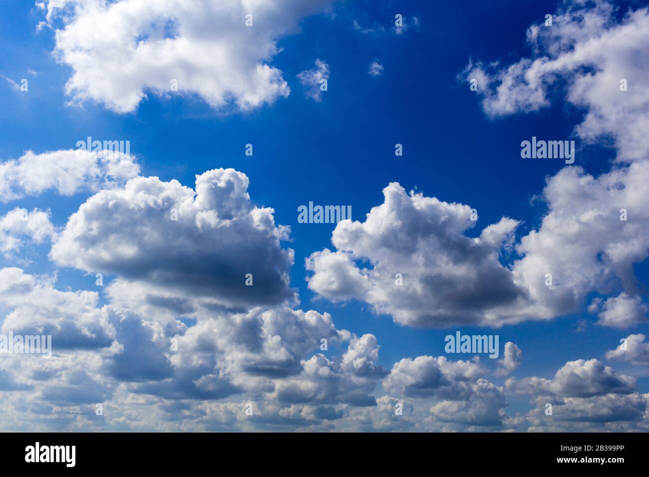 Blue summer sunny sky with white clouds.Background Stock Photo - Alamy