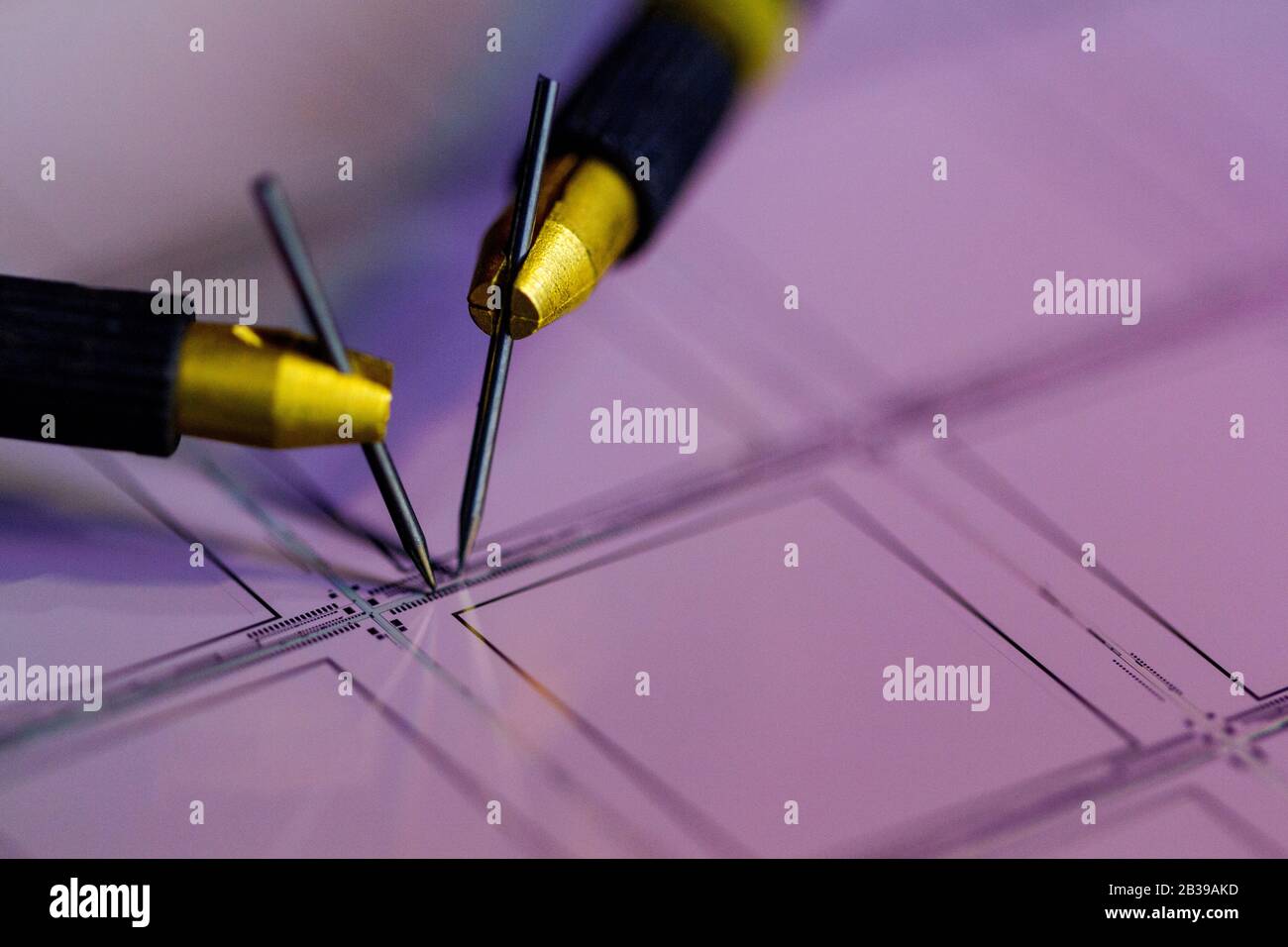 Manual probe system with needles for test of semiconductor on silicon
