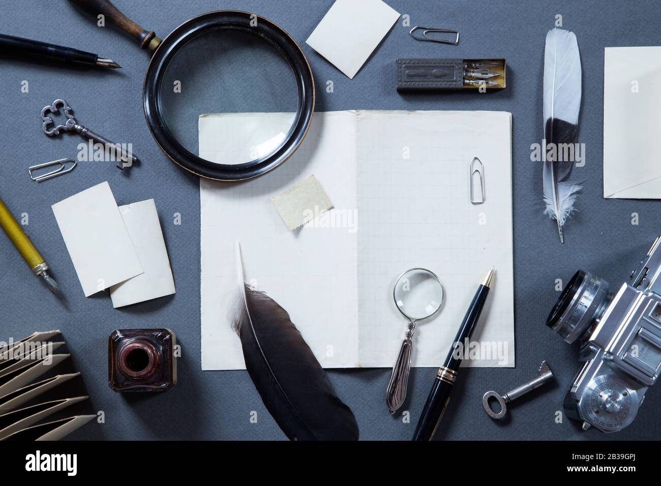Vintage writing set with an old camera Stock Photo Alamy
