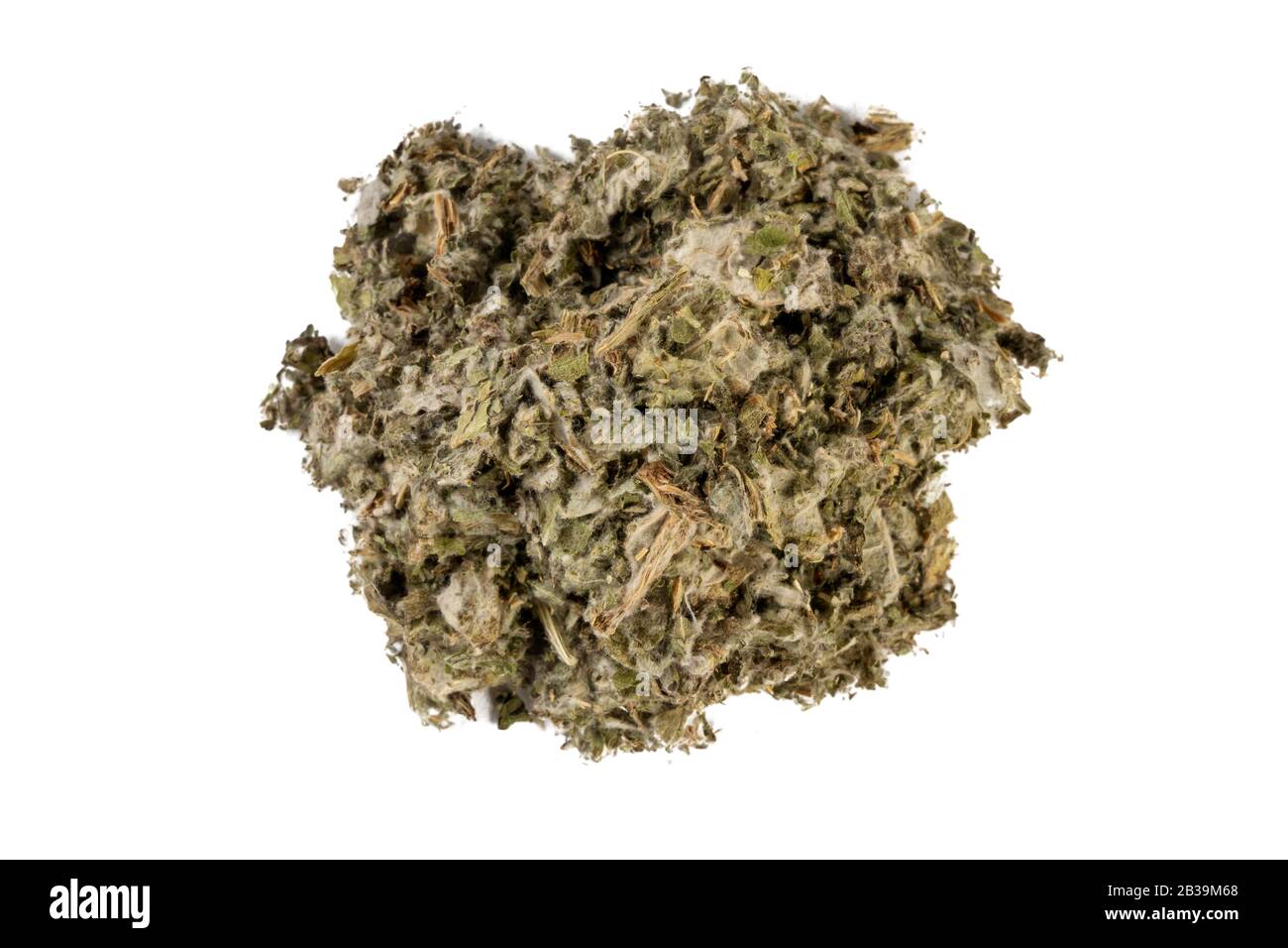 dried artichoke leaves or in latin Cynarae folium heap of isolated on