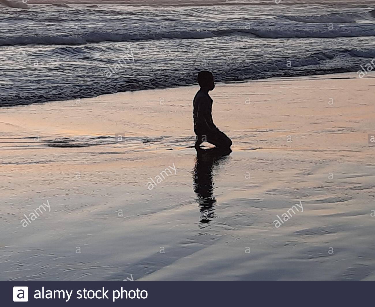 Kneeling Silhouette High Resolution Stock Photography and Images - Alamy