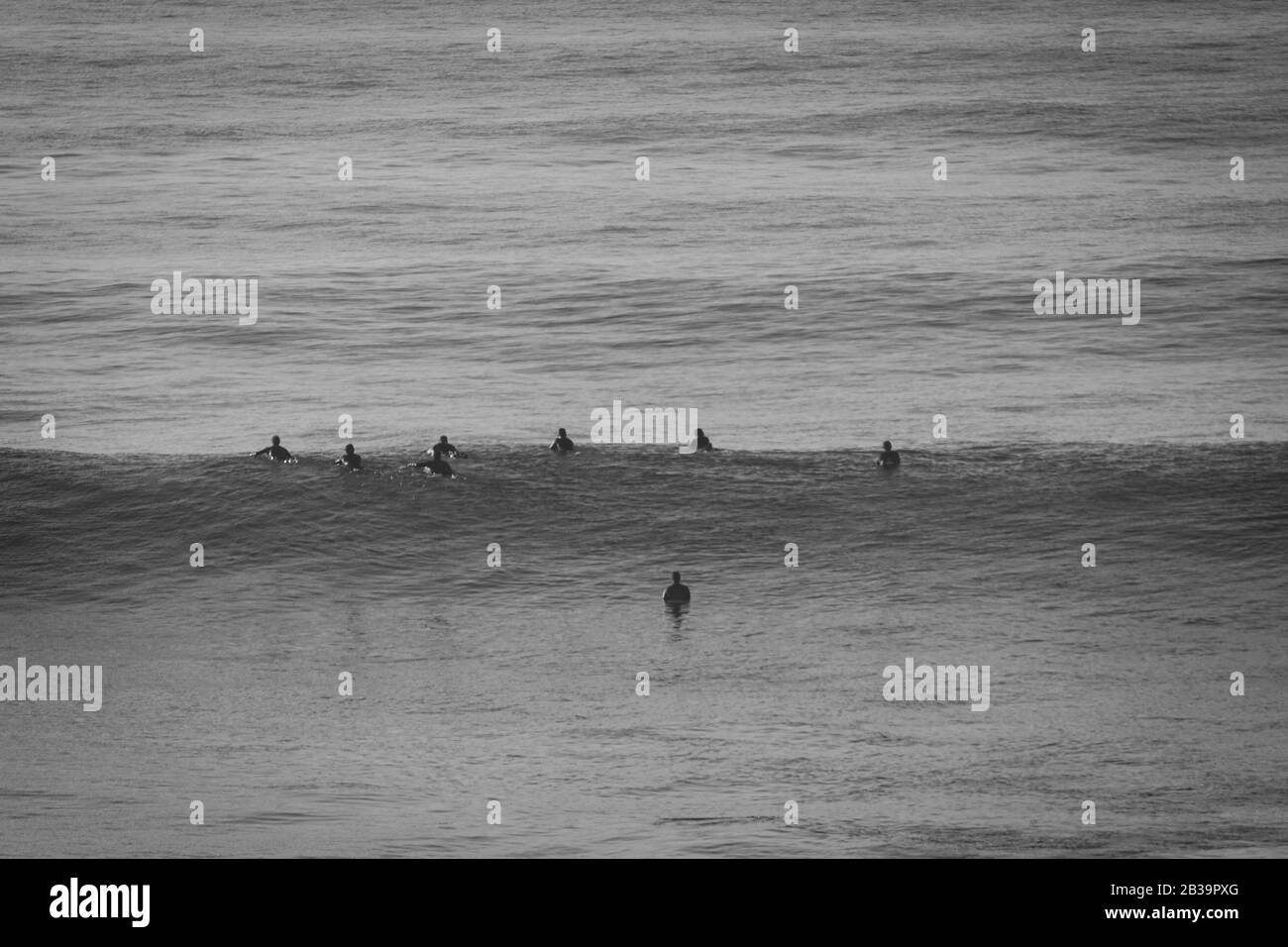 Group of young people at the beach Black and White Stock Photos ...