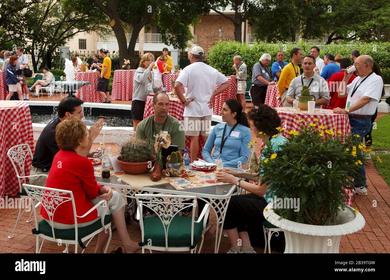 Austin Texas USA, April 17 2004: Reception for sponsors and donors on the grounds of the Governor's Mansion in conjunction with a Fitness Fair at the Texas Capitol. ©Bob Daemmrich Stock Photo