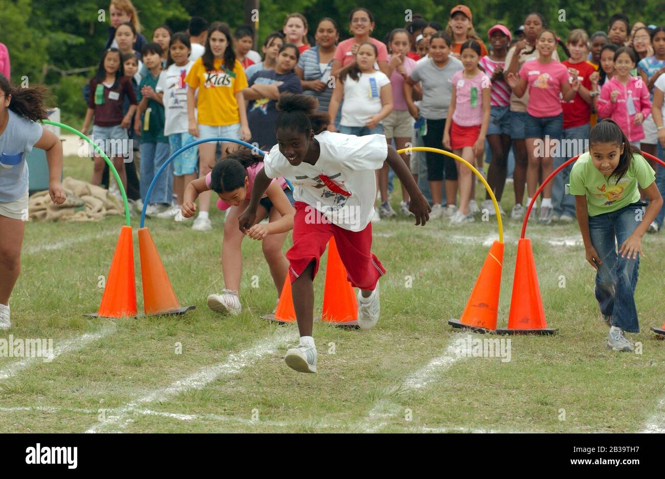 Austin Texas USA, circa 2004 Fifthgrade girls compete on obstacle