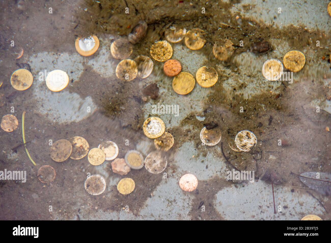 Throw coins well hires stock photography and images Alamy