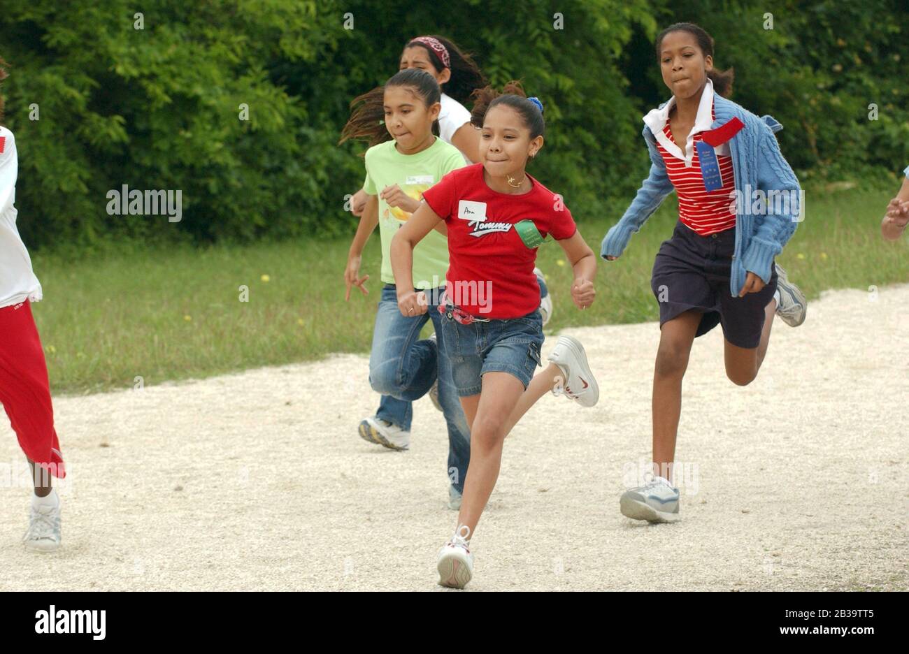 Austin Texas USA, circa 2004: Fourth-grade girls compete in mile run ...