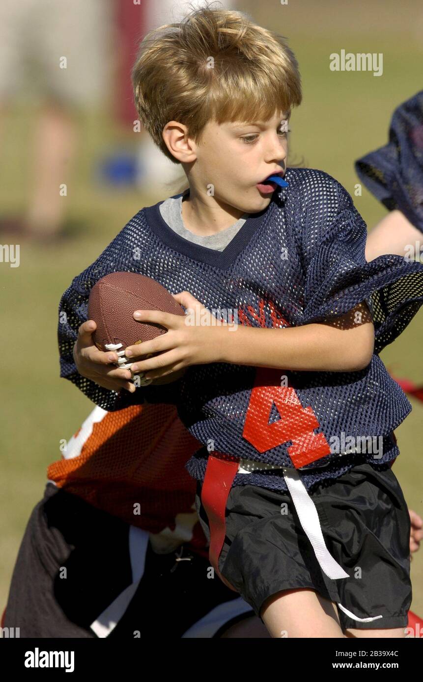 Boys american flag football game hires stock photography and images