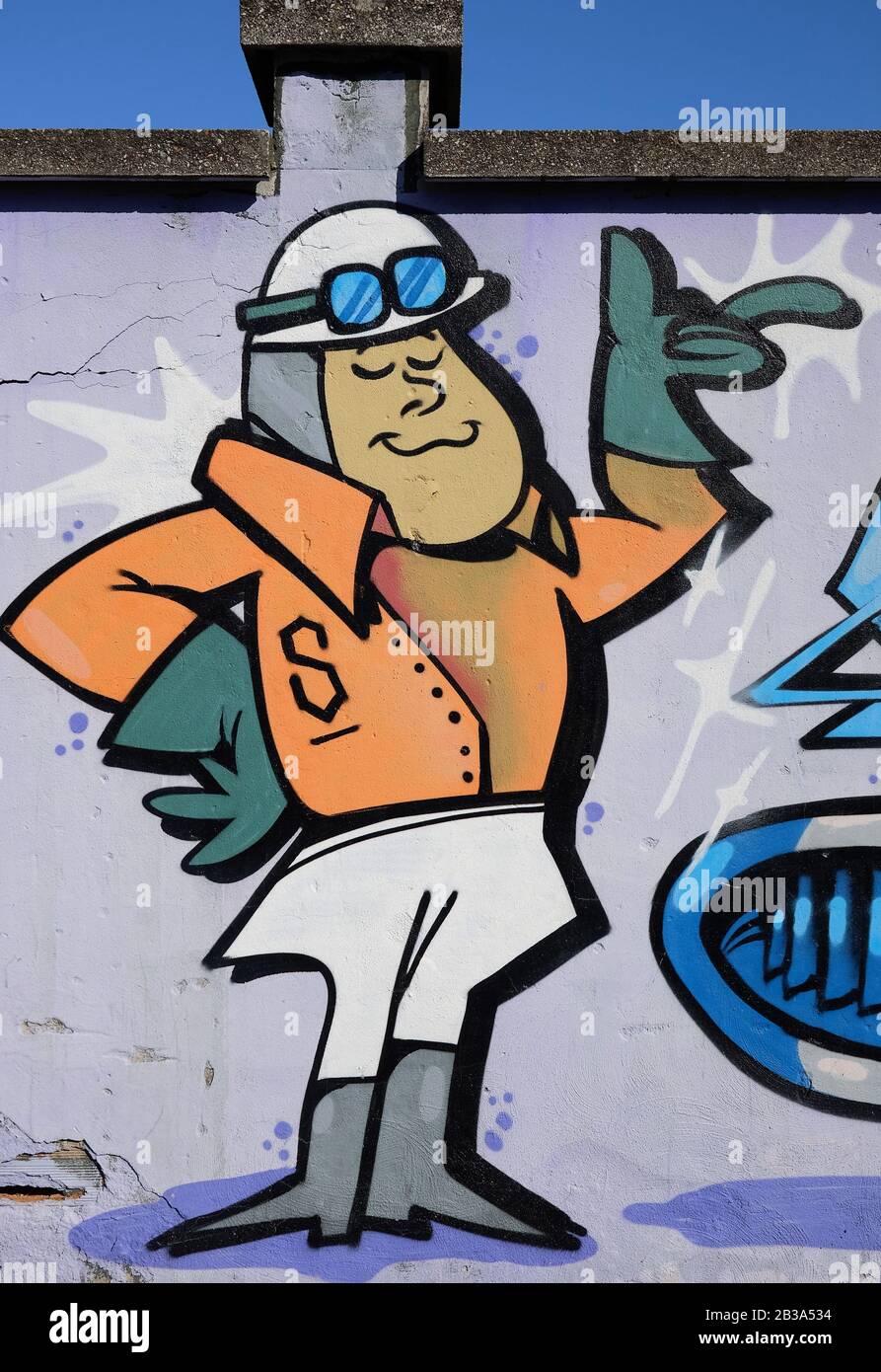 Modern grafiiti in Milan, Italy depicting the driver Peter Perfect (Wacky Races cartoons of Hanna-Barbera) Stock Photo