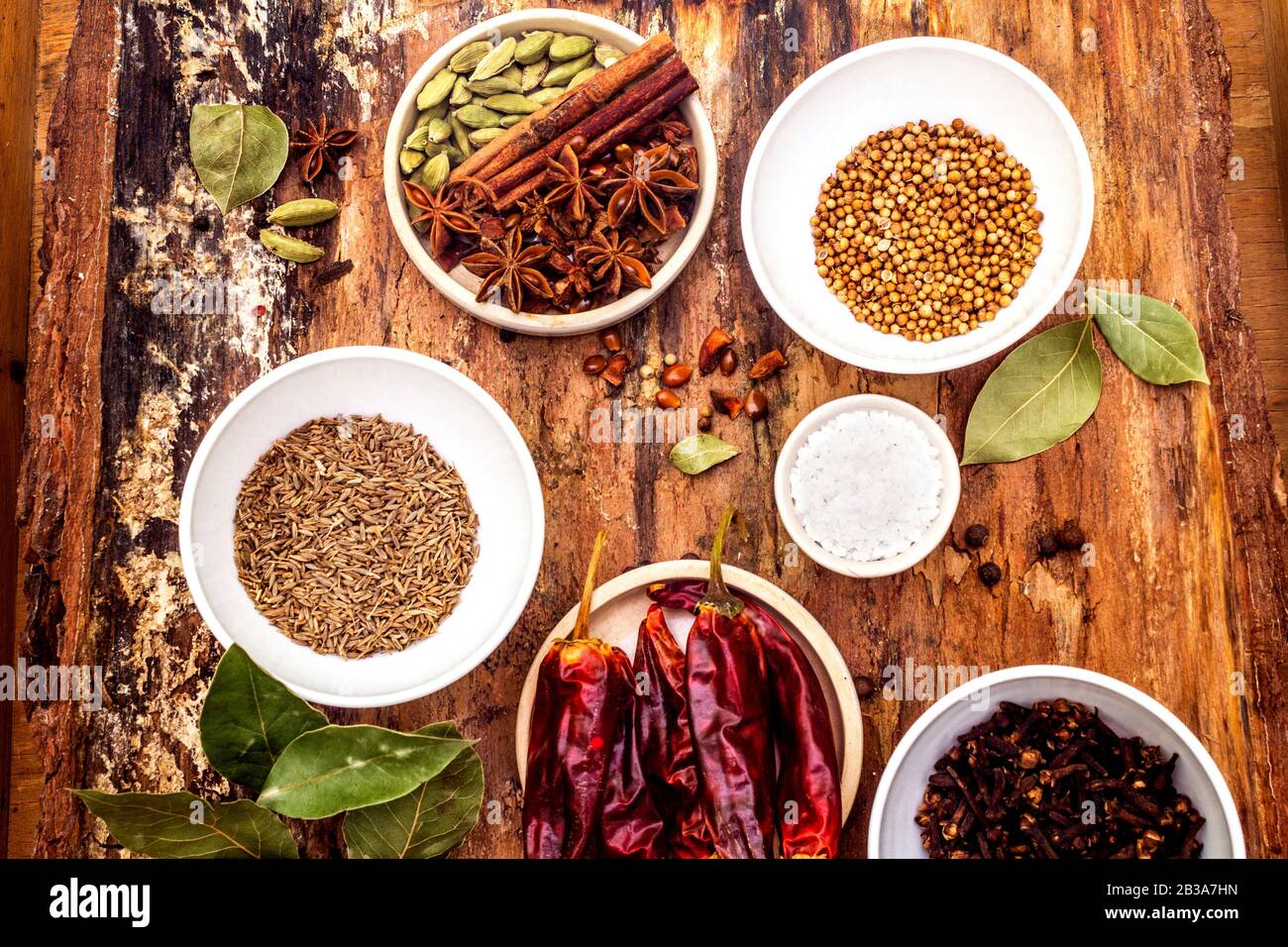 Set of different spices and herbs allspice, cumin, hot pepper, bay