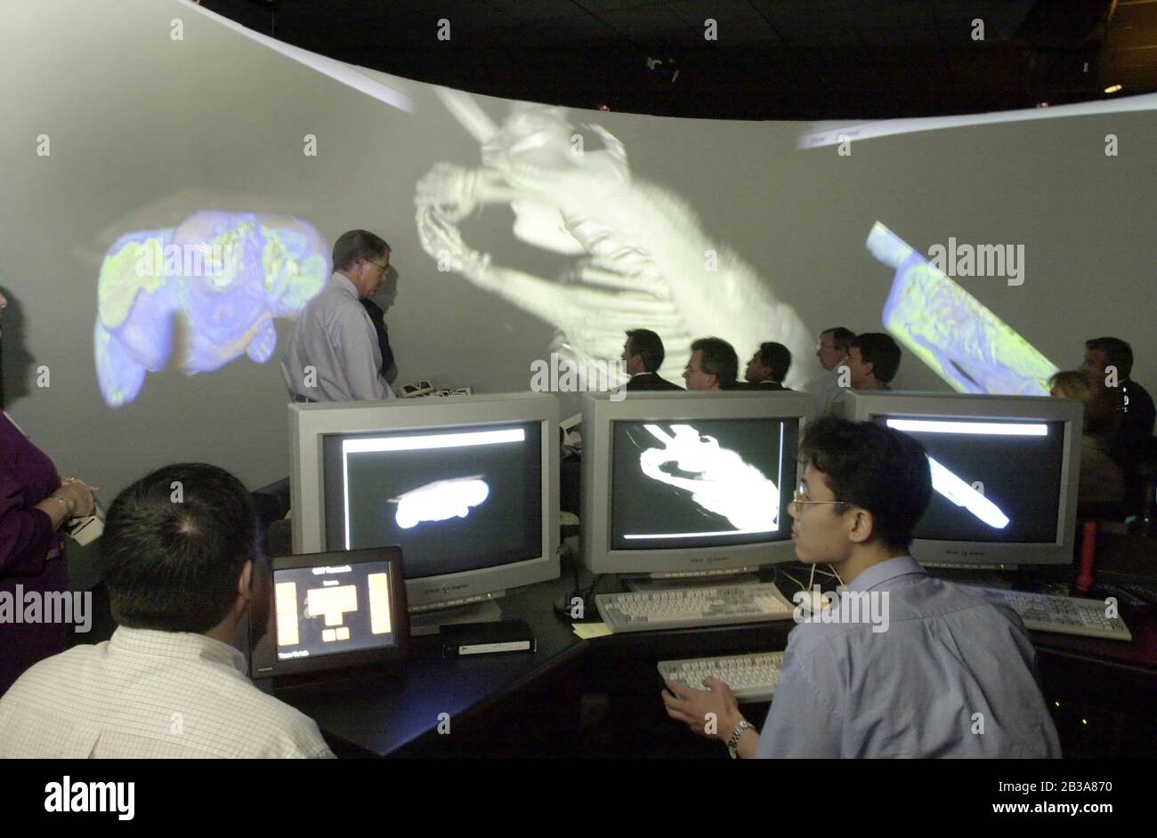 Austin, Texas 19 OCT 2000:  Visitors to the University of Texas at Austin Visual Research Laboratory (VRL) at the Applied Computational Engineering and Sciences Building (ACES) watch a simulated mathematical model of an exploding galaxy during the dedication of the building Thursday. Images are beamed onto a cylindrical screen using 13 projectors and an SGI Onyx2 Supercomputer. ©Bob Daemmrich Stock Photo