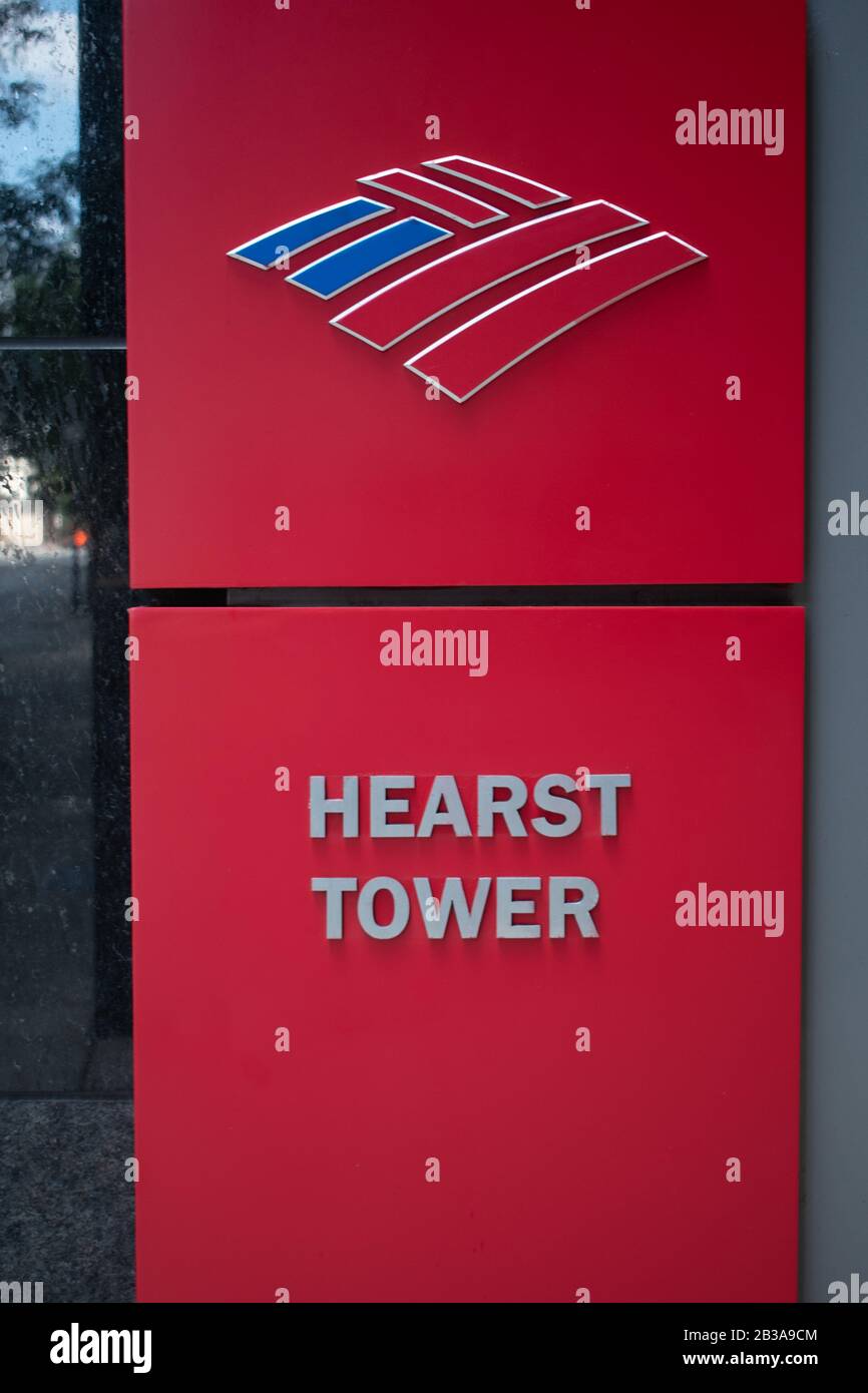 Charlotte, NC/USA - May 26, 2019: Double sidewalk sign in red with 'Bank of America' logo on top part and 'Hearst Tower' on bottom part. Stock Photo