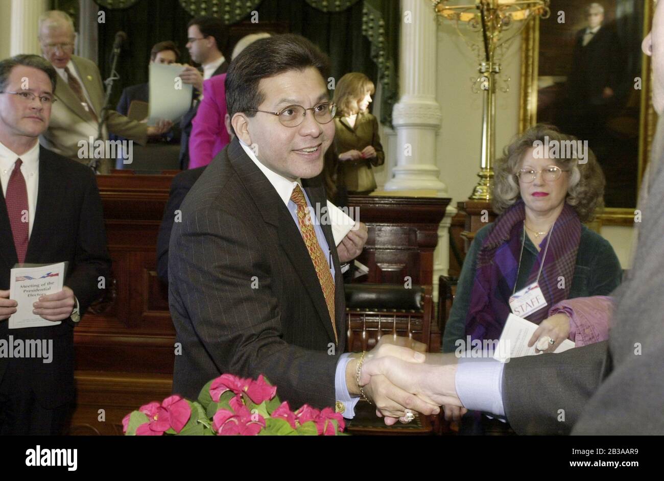 Austin, Texas  USA, 18 DEC 2000: Texas Supreme Court Justice Al Gonzalez of Houston is congratulated after being appointed by President-elect George w. Bush as General Counsel at the White House in the new Bush administration. ©Bob Daemmrich Stock Photo