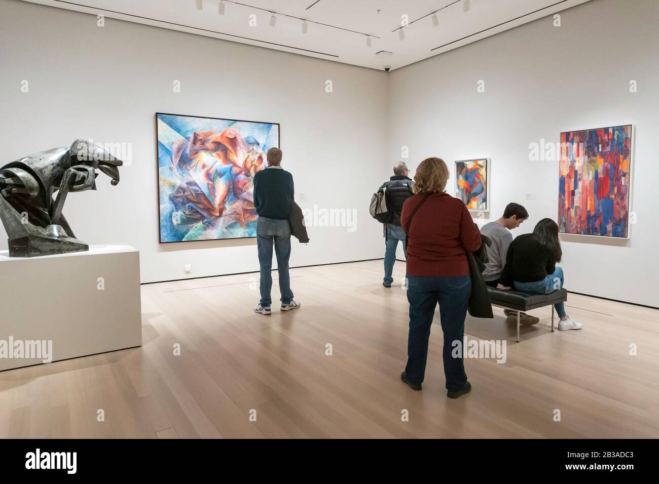 Visitors Viewing Paintings at the Museum of Modern Art, NYC Stock Photo