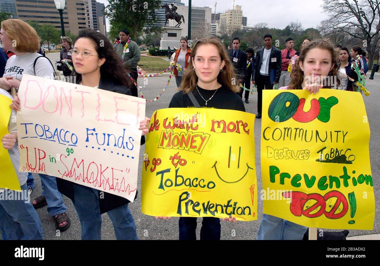 Austin, Texas USA, Feb. 8, 2001: Central Texas high school students gather  outside the Texas Capitol for an 'Up in Smoke' rally, calling on legislators to push for more tobacco settlement money earmarked to smoking prevention programs. The students also decried tobacco companies' marketing efforts geared toward getting teens hooked on smoking. ©Bob Daemmrich Stock Photo