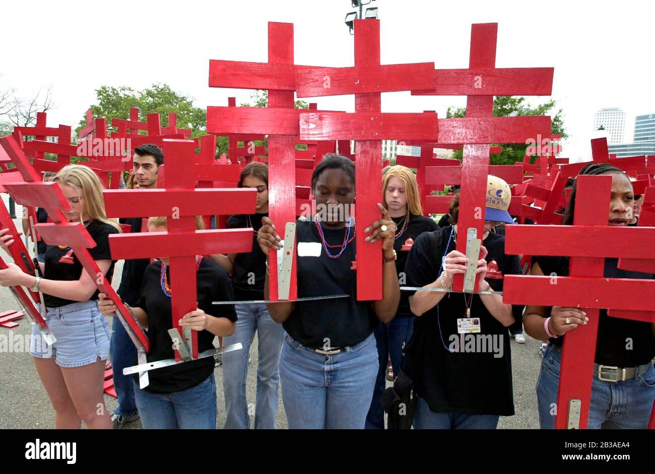 Austin, Texas USA, April 4 2001: More than 200 Texas high school students gathered at the State Capitol carrying 600 crosses signifying the daily U.S. deaths due to smoking and lung disease. The event was staged to highlight the program of Teens Against Tobacco Use (TATU), a peer-based tobacco use prevention program sponsored by the American Lung Association. ©Bob Daemmrich Stock Photo