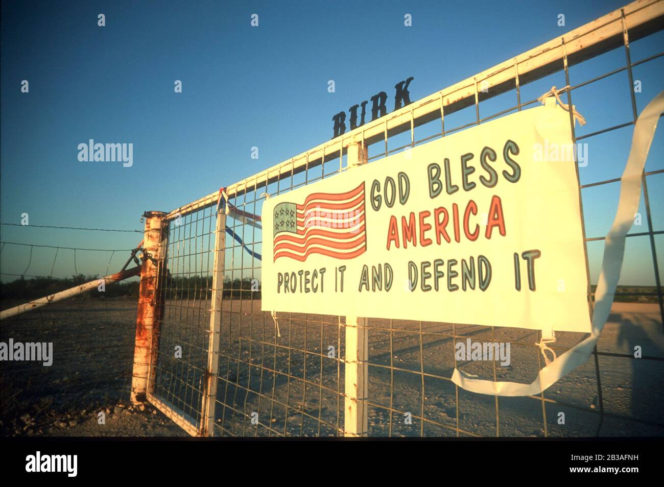Del Rio, Texas USA, October 2001:  A sign on a ranch gate in Val Verde County, Texas near Del Rio expresses the sentiments of the landowner following the Sept. 11, 2001, terrorist attacks on America. ©Bob Daemmrich Stock Photo