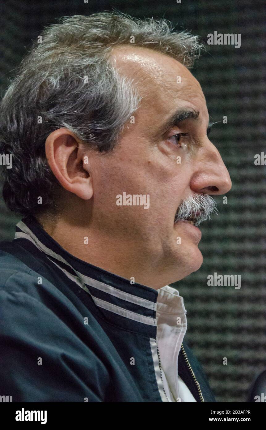The former Secretary of Internal Trade, Guillermo Moreno in an interview at an Argentine university radio station Stock Photo